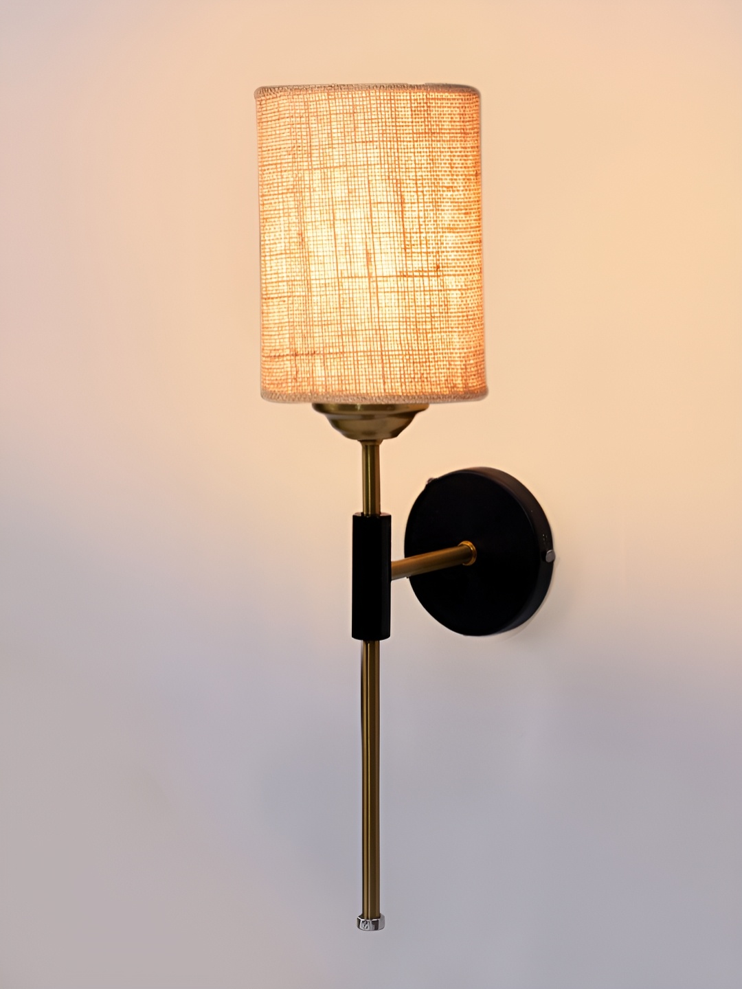

Devansh Beige & Gold-Toned Metal Traditional Abstract Shaped Shaped Wall Lamp