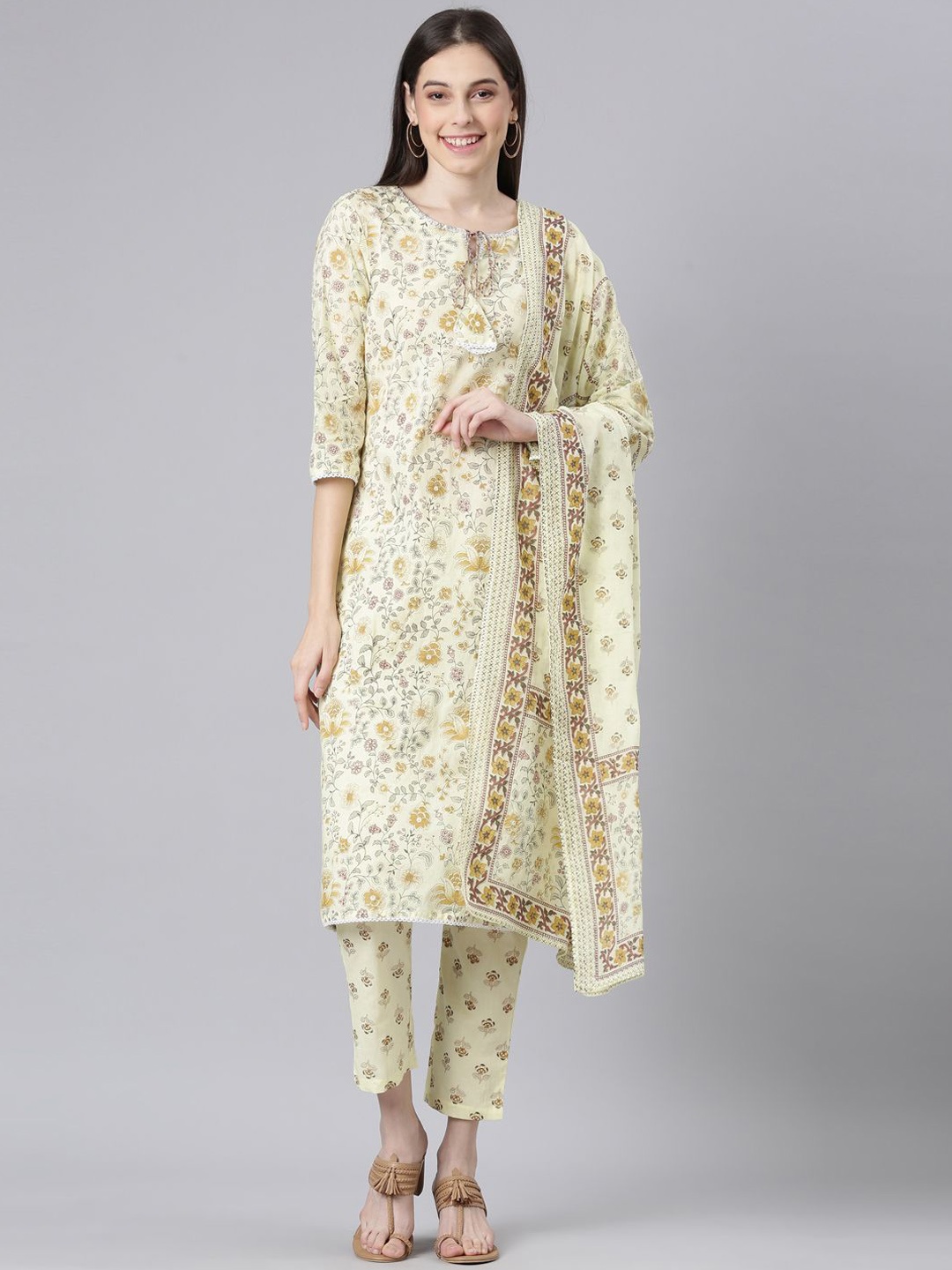 

Neerus Floral Printed Tie-Up Neck Straight Kurta With Trousers And Dupatta, Yellow