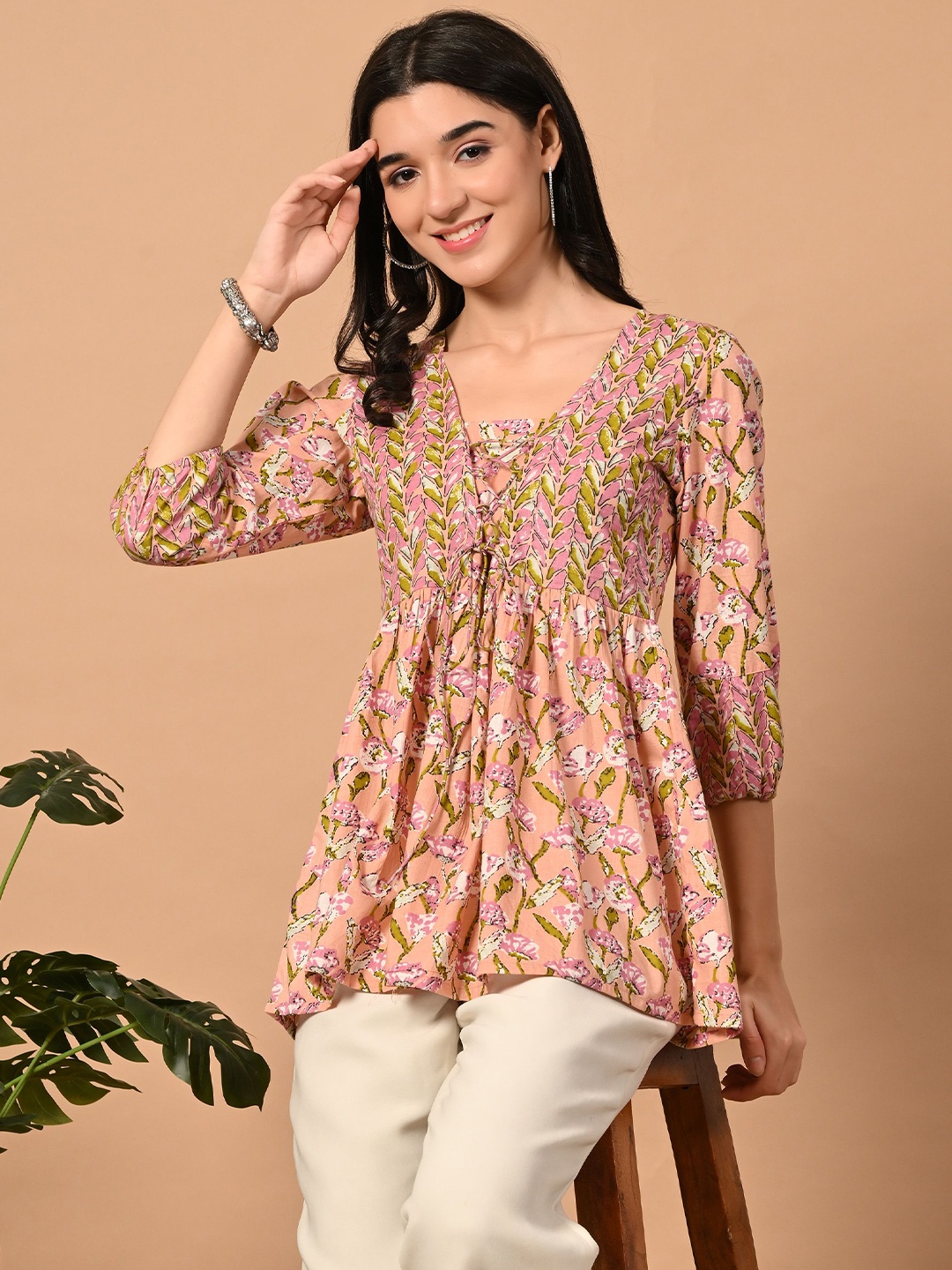 

Aktasa Women Floral Printed Cotton A-Line Top, Peach