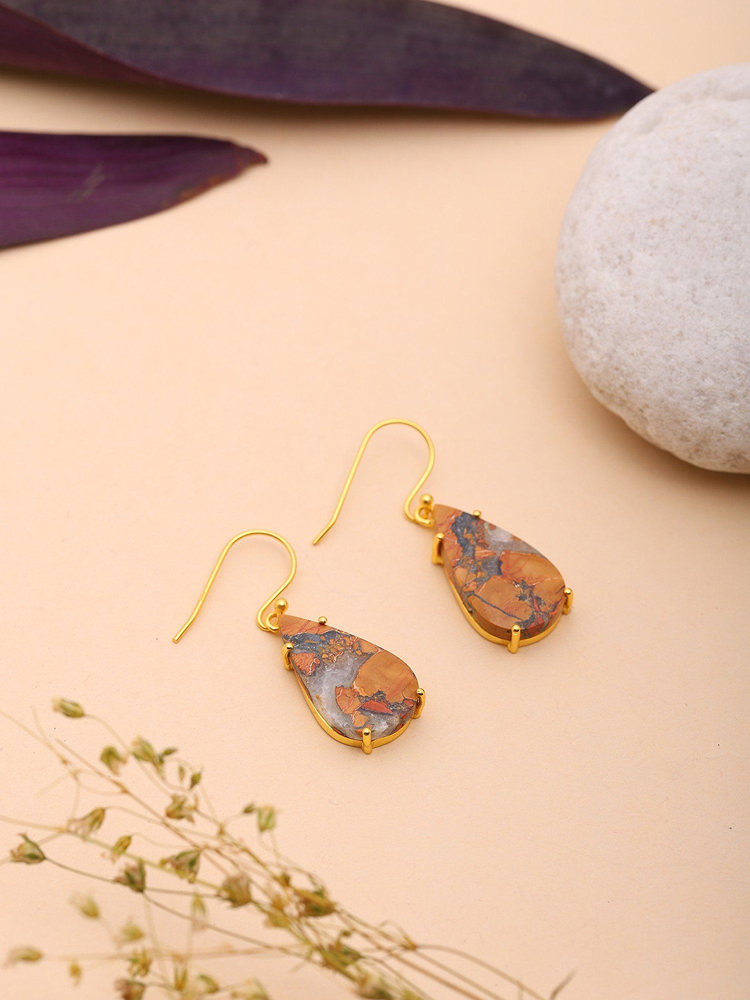 

Exotic India Sterling Silver Gold-Plated Teardrop Shaped Artificial Stones Studs Earrings, Brown