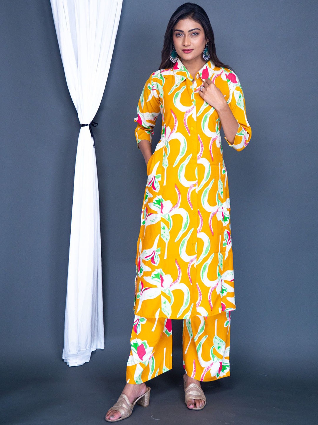 

The Kalakriti House Women Printed Regular Liva Kurta with Palazzos, Mustard
