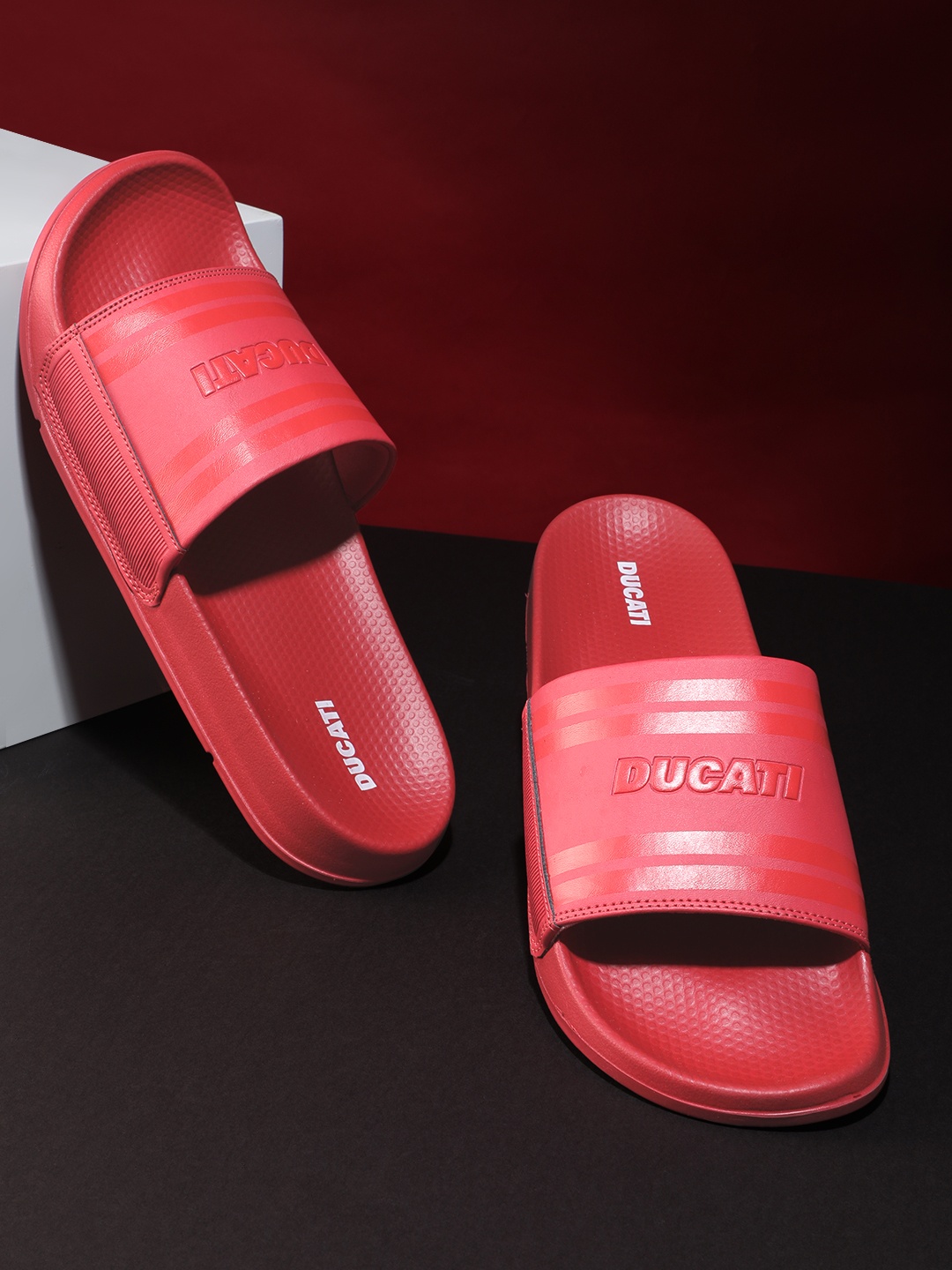 

Ducati Men Self Design Sliders, Red