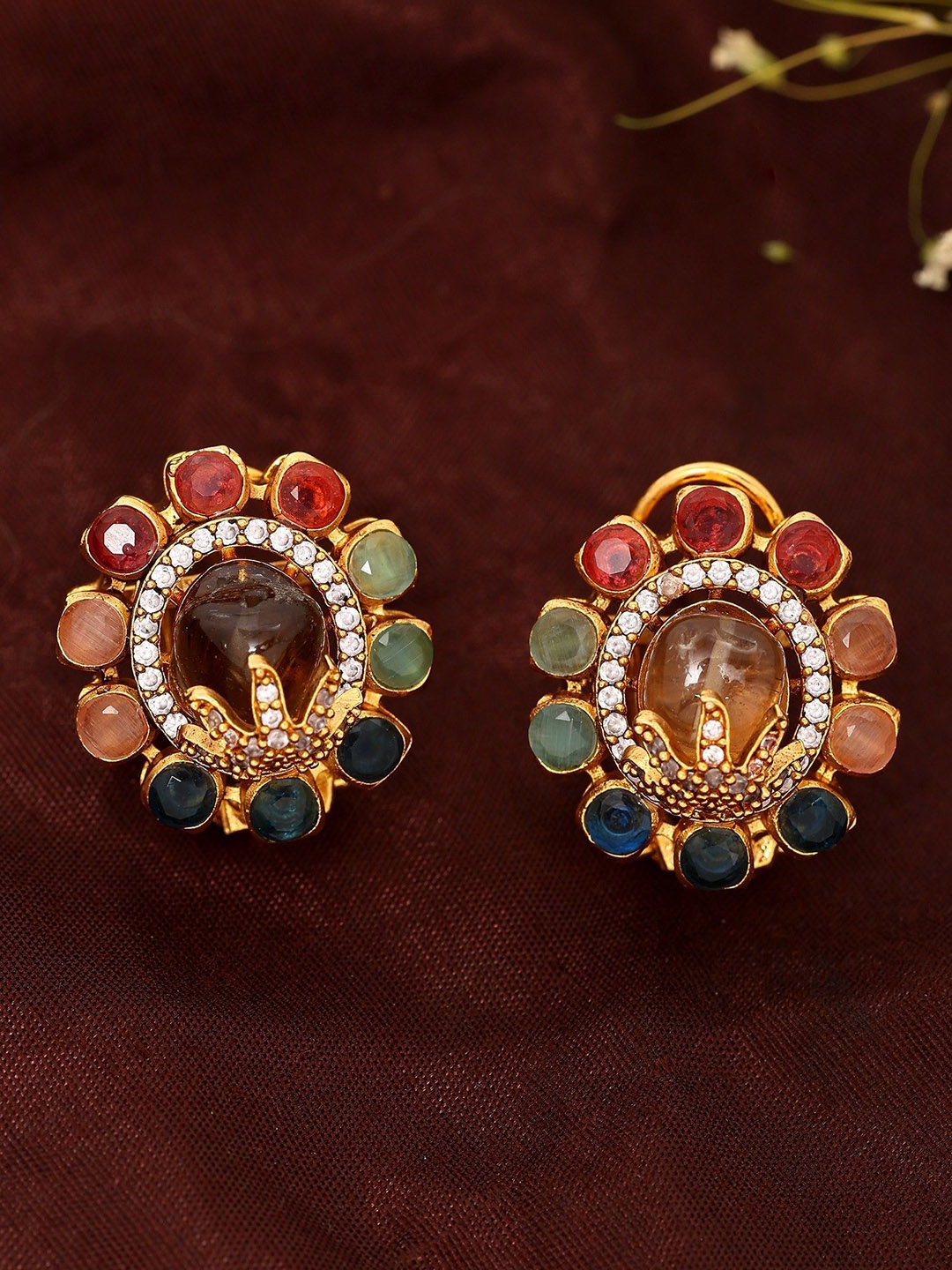 

Exotic India Gold Plated Floral Studs Earrings