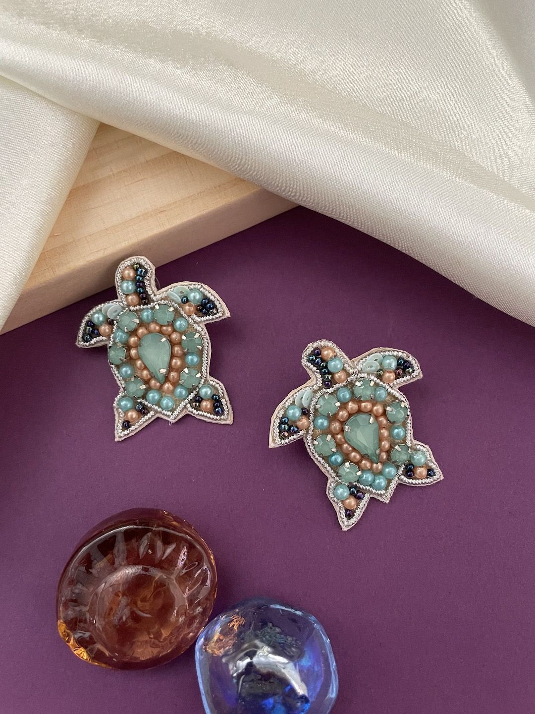

Digital Dress Room Artificial Stone Studded & Beaded Turtle Design Drop Earrings, Blue