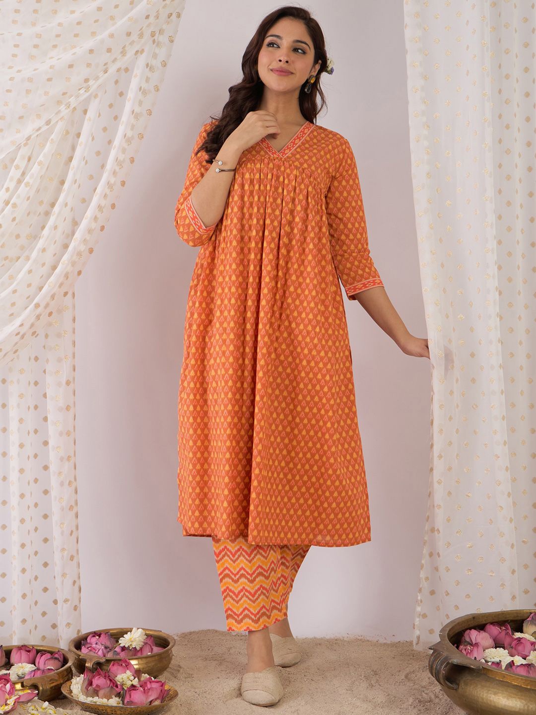 

Indo Era Floral Printed Empire Pure Cotton A-Line Kurta With Trousers, Orange