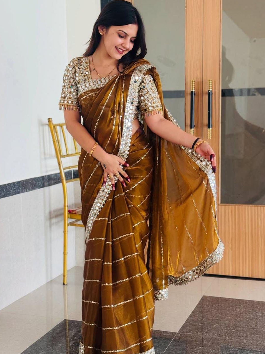 

MANSUBHA Nandaprema Striped Embroidered Mirror Work Tissue Saree, Mustard