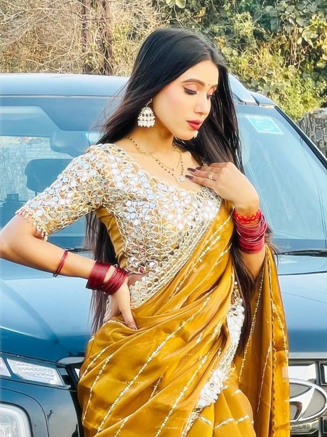 

MANSUBHA Nandaprema Striped Embroidered Mirror Work Tissue Saree, Mustard
