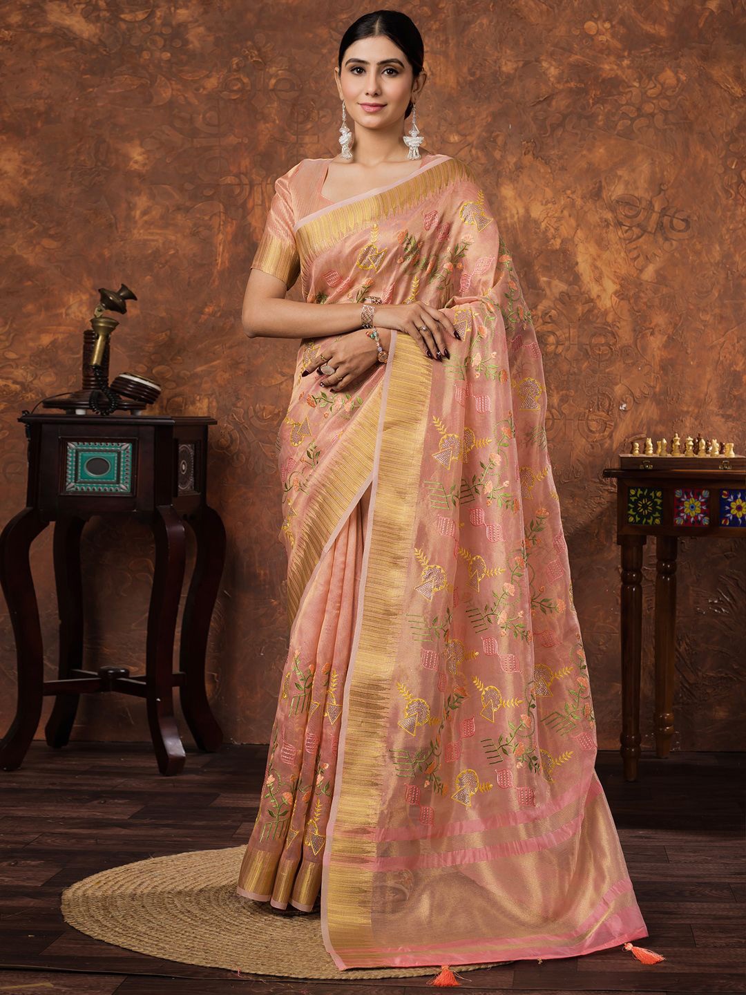 

Saree mall Embroidered Ethnic Motifs Zari Tissue Sarees, Peach