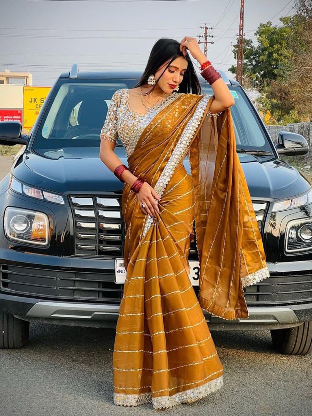 

MANSUBHA Nandaprema Striped Embroidered Mirror Work Tissue Saree, Mustard