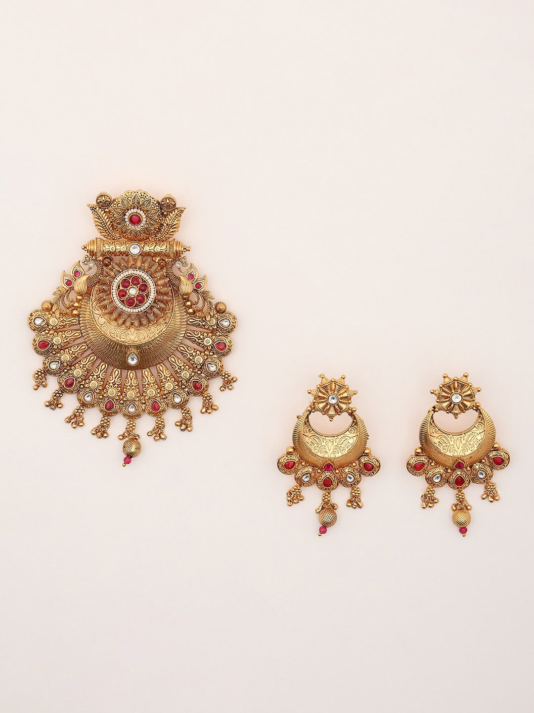 

Exotic India Stone Studded Pendant And Earrings Set, Gold