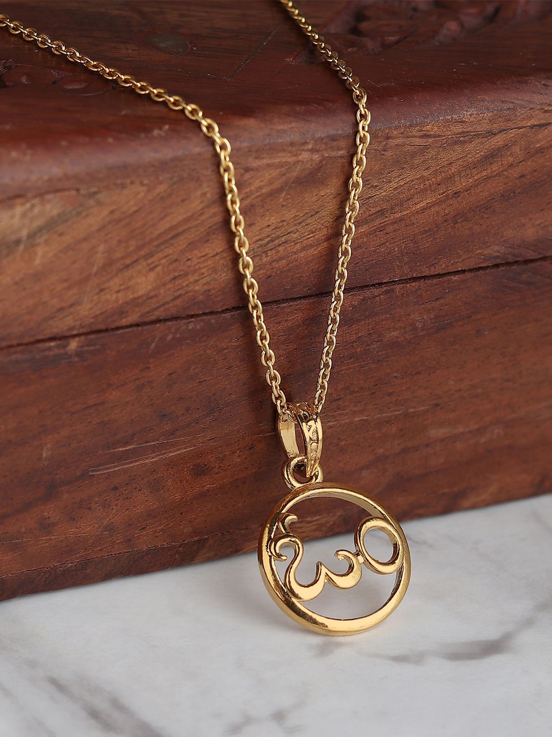 

Metronaut Gold-Plated Circular Pendants
