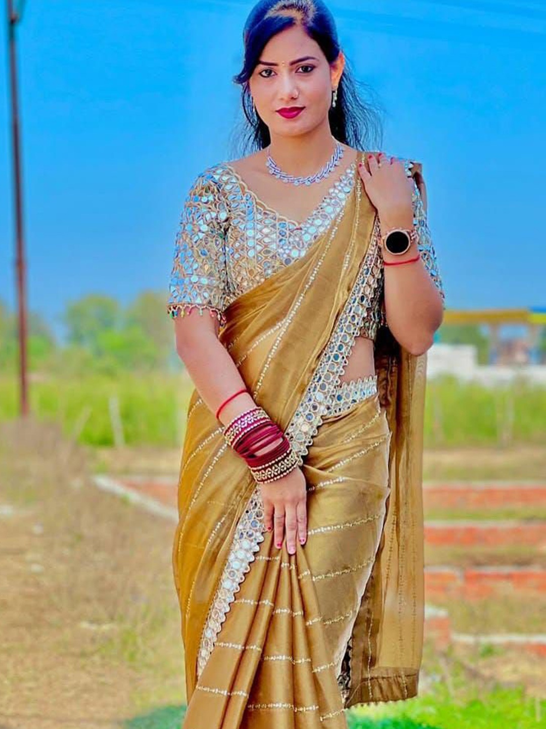 

MANSUBHA Striped Embellished Mirror Work Tissue Saree, Mustard