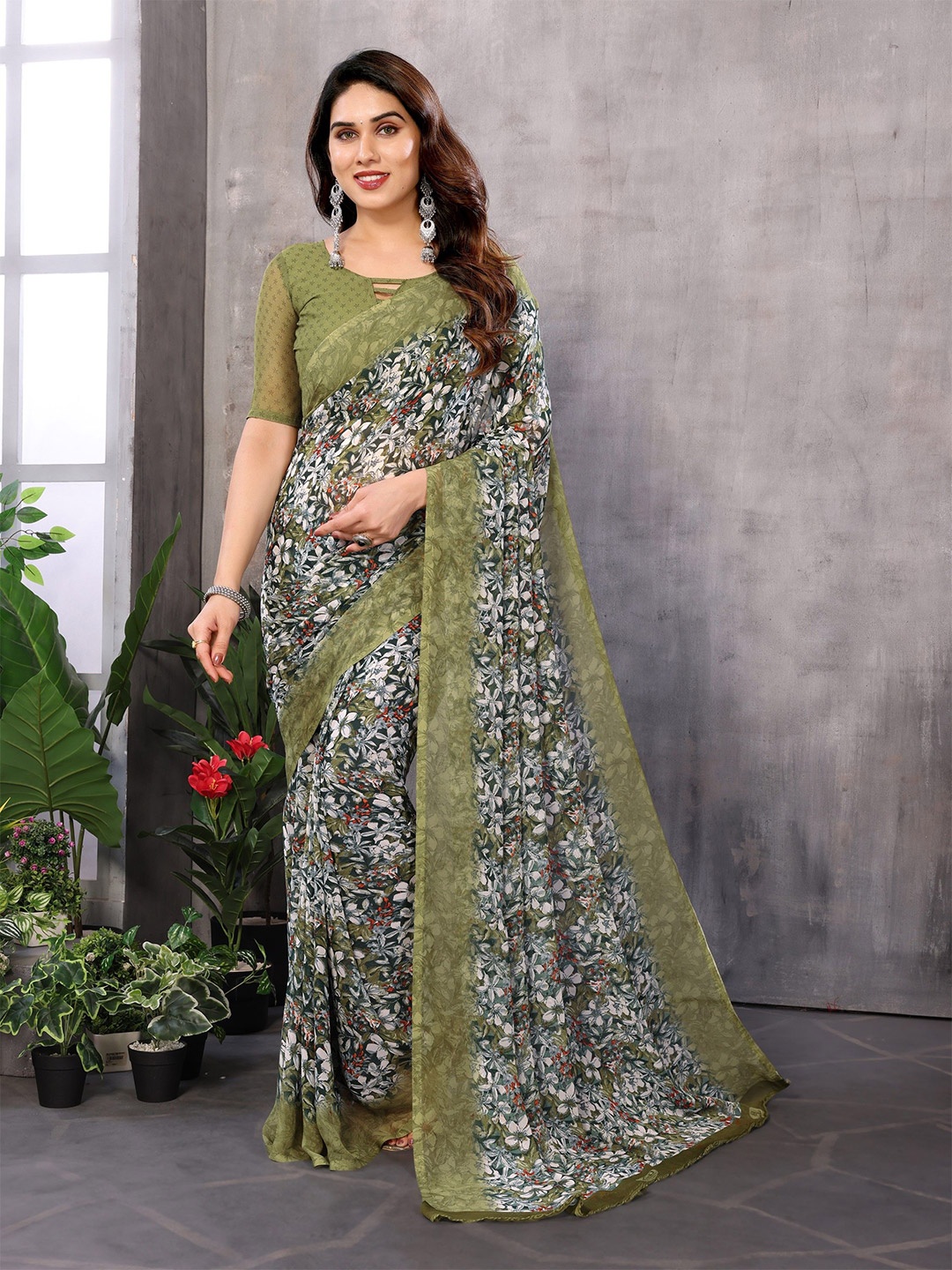 

Nirmohi Fashion Floral Pure Georgette Designer Saree, Green