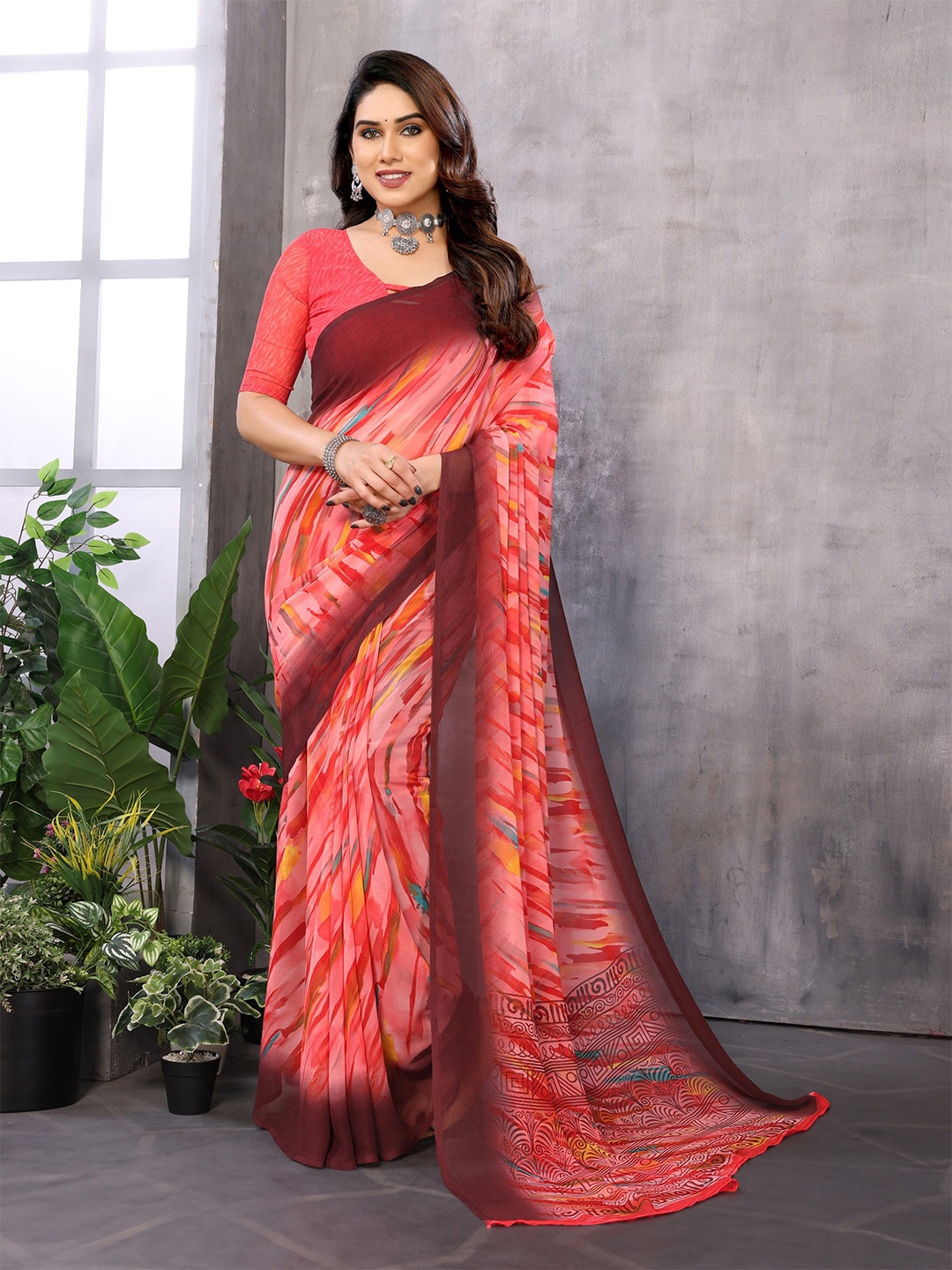 

Nirmohi Fashion Abstract Printed Pure Georgette Saree, Red