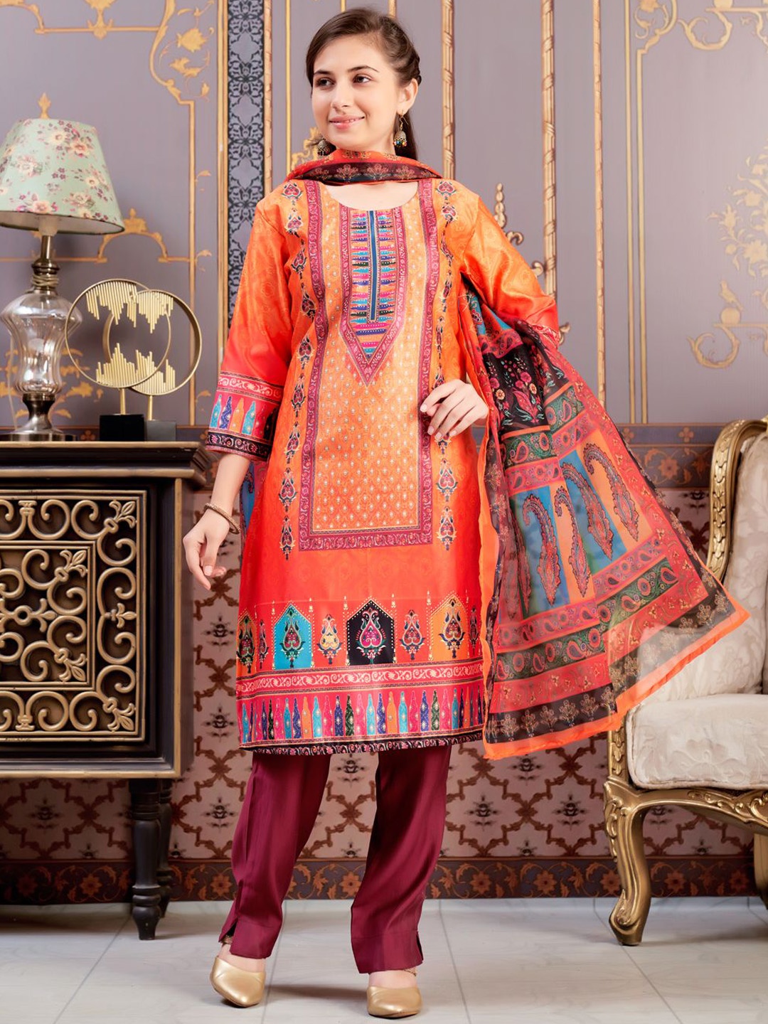 

BAESD Girls Ethnic Motifs Printed Round Neck Satin Kurta With Trousers & Dupatta, Orange