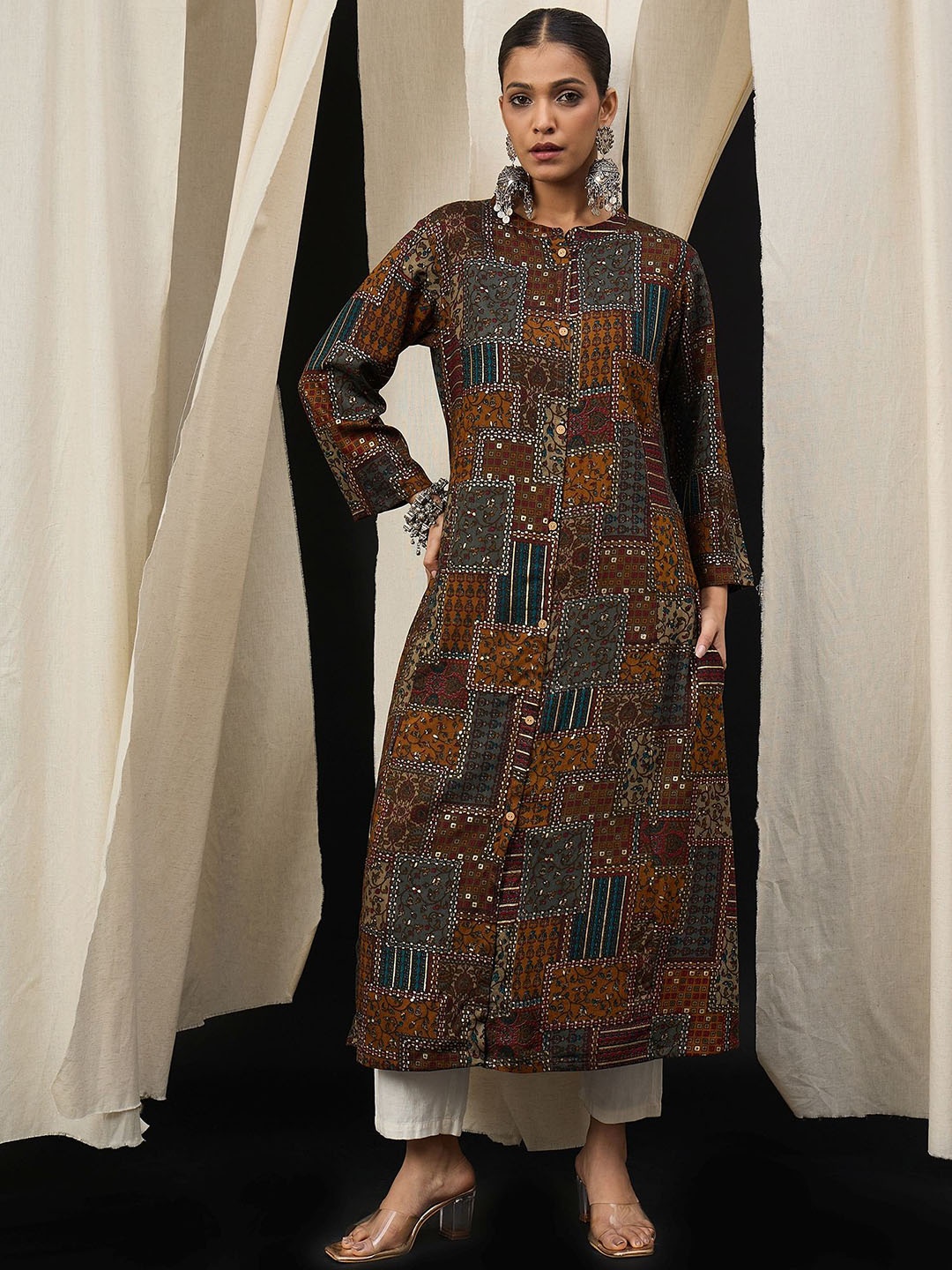 

Anouk Women Floral Printed Thread Work Kurta, Mustard