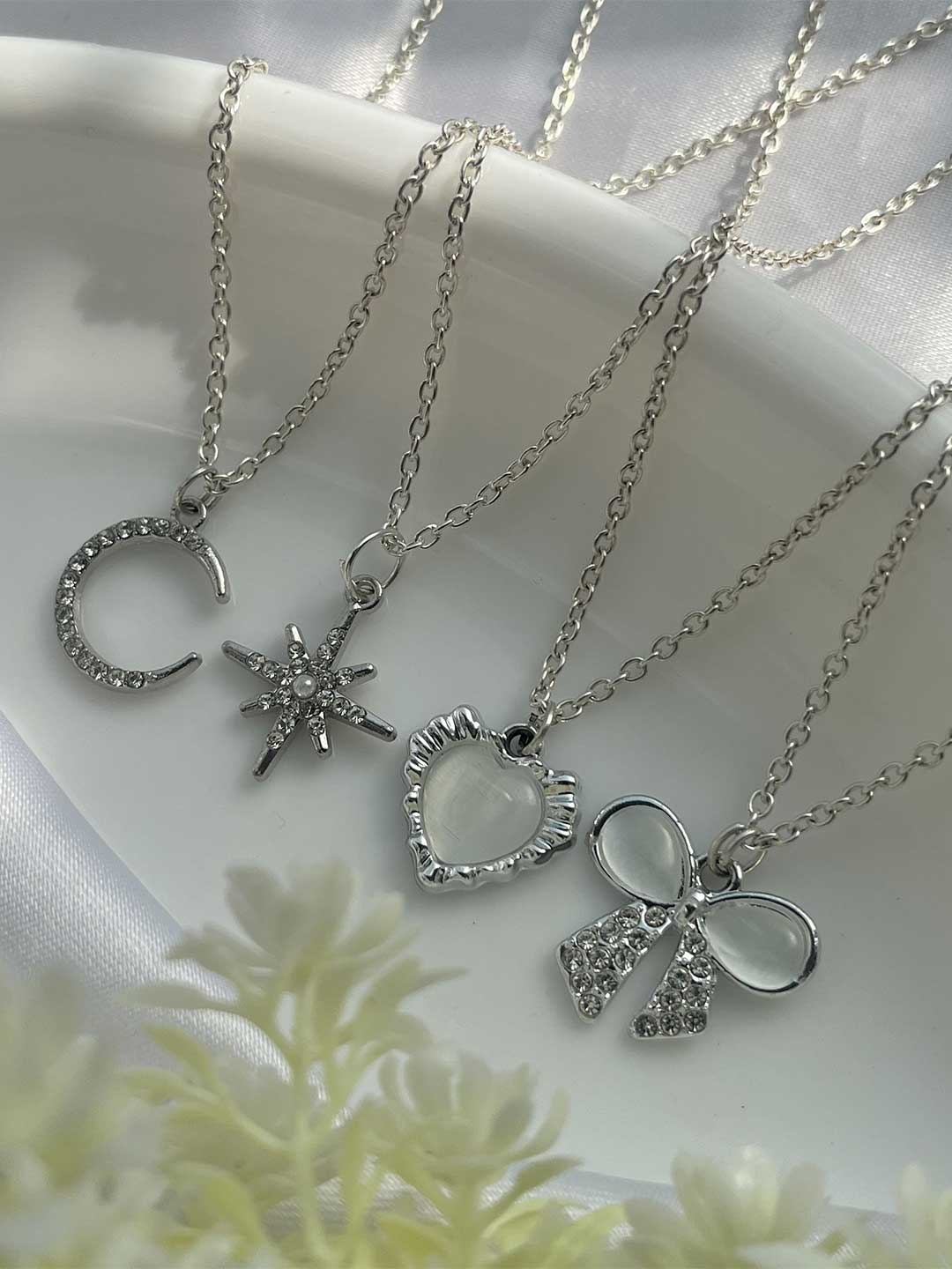

Jewelsbysirani Set Of 4 Silver-Plated American Diamond Studded Pendants With Chains