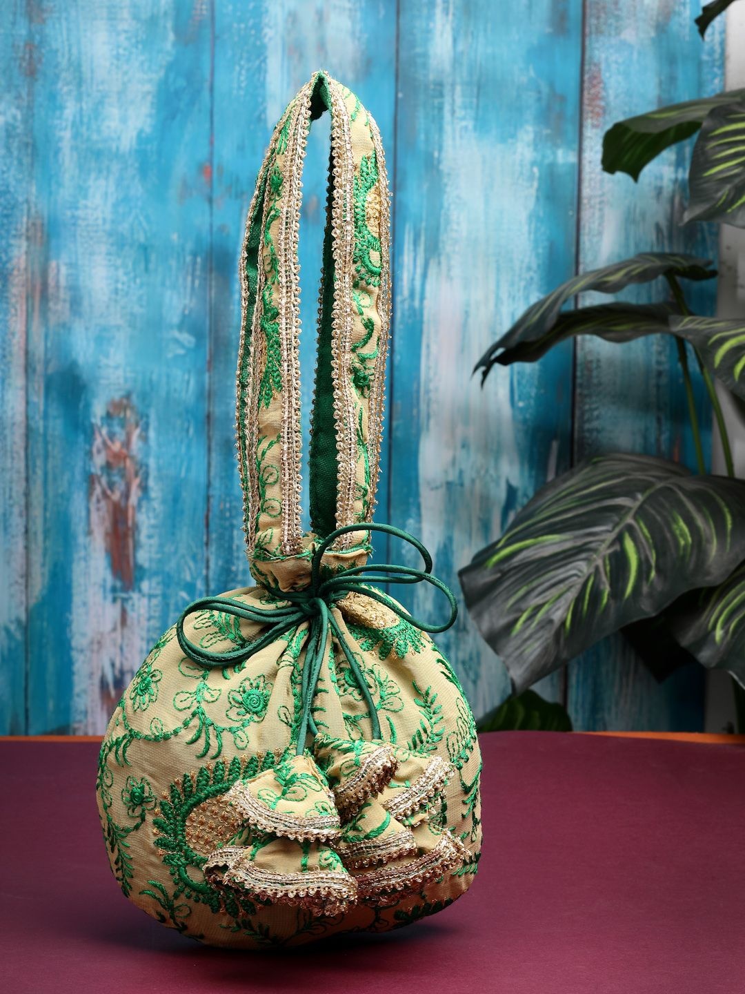 

Dhrohar Floral Embroidered Potli, Yellow