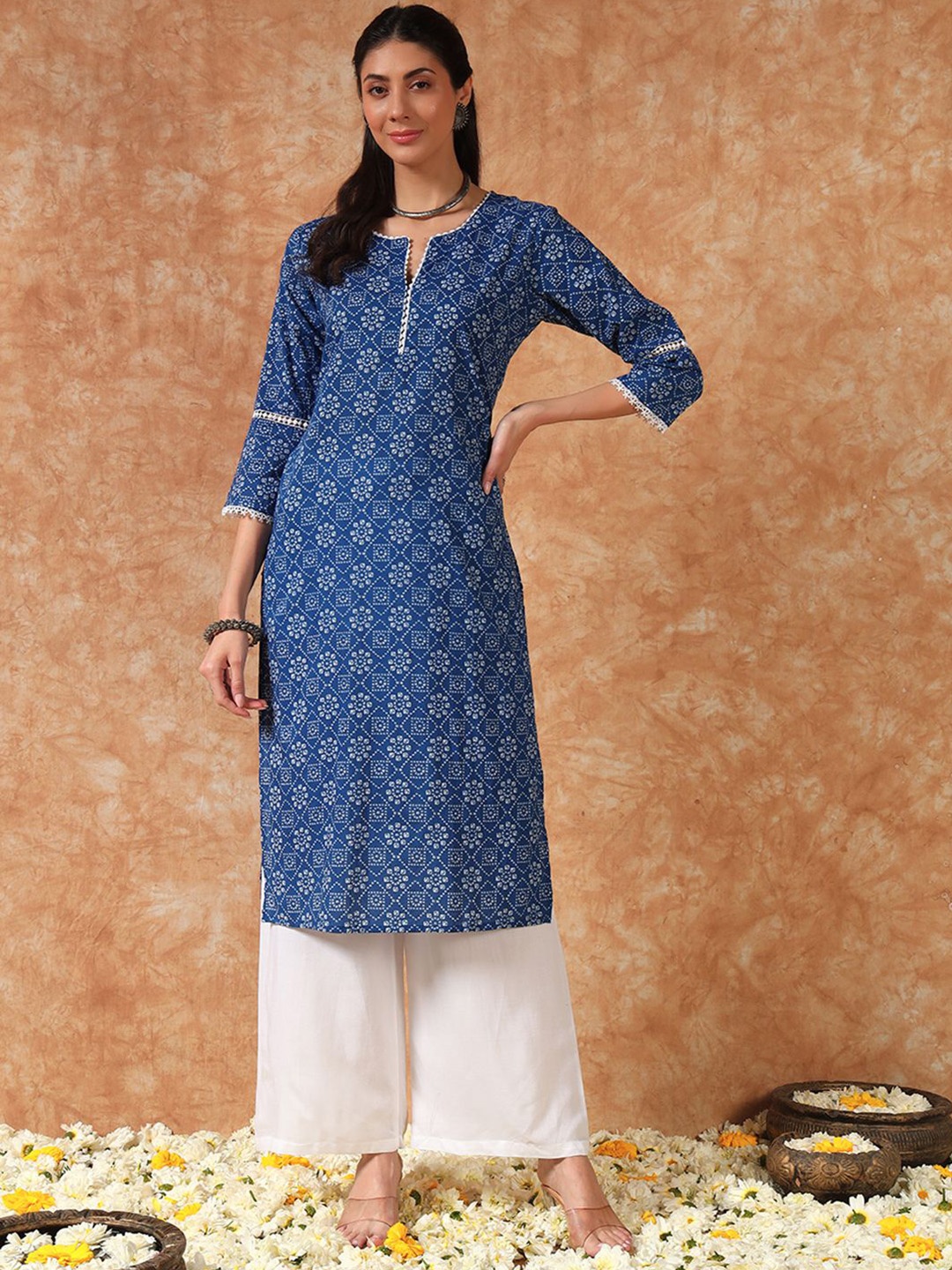 

Meeranshi Bandhani Printed Notch Neck Three-Quarter Sleeves Cotton Straight Kurta, Blue