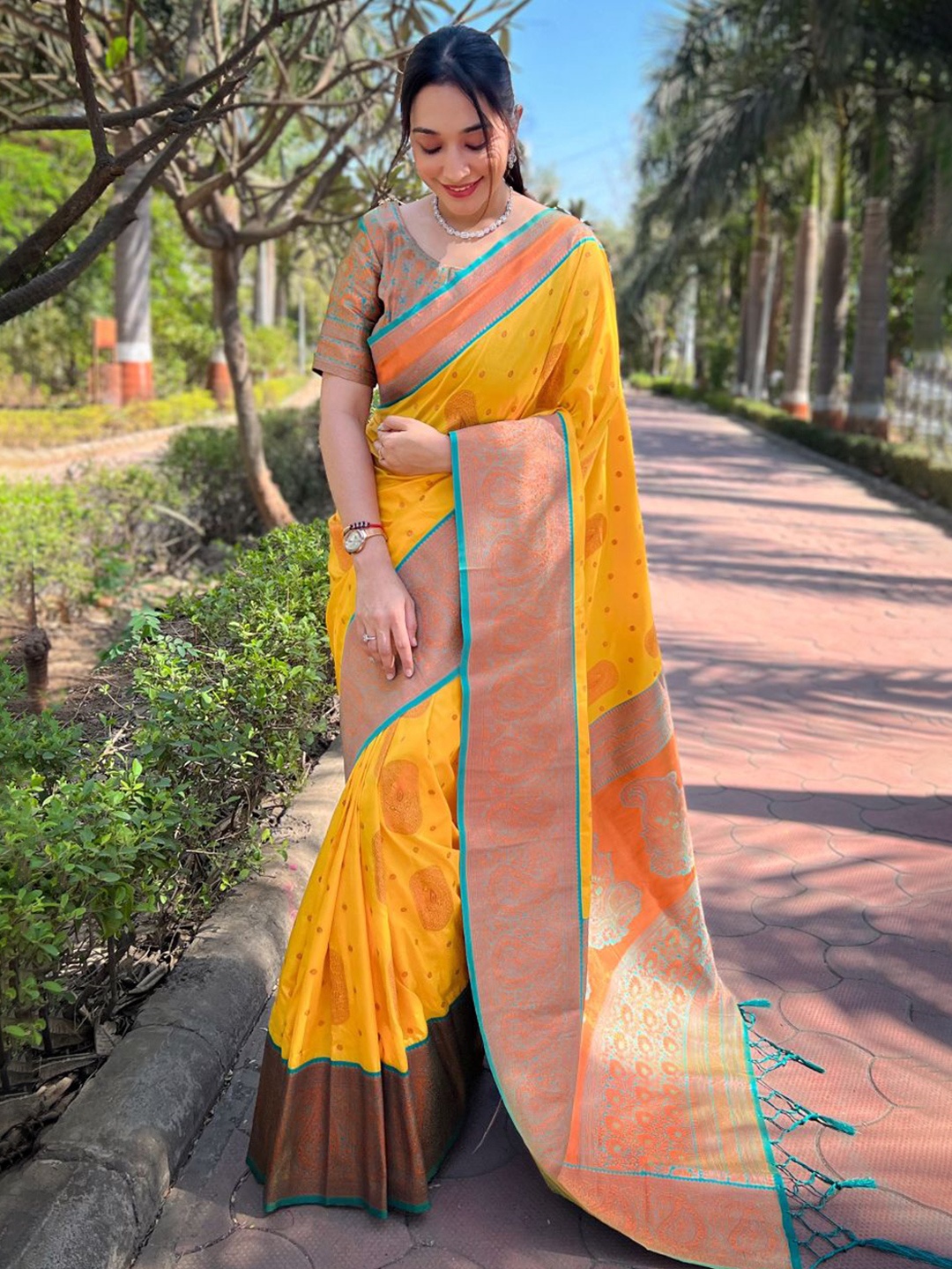 

Rangtulika Ethnics Woven Design Zari Banarasi Saree, Yellow