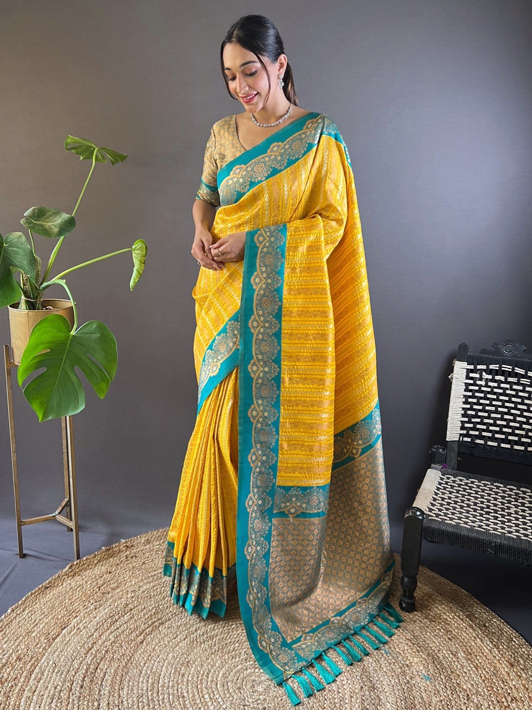 

Rangtulika Ethnics Woven Design Zari Saree, Yellow