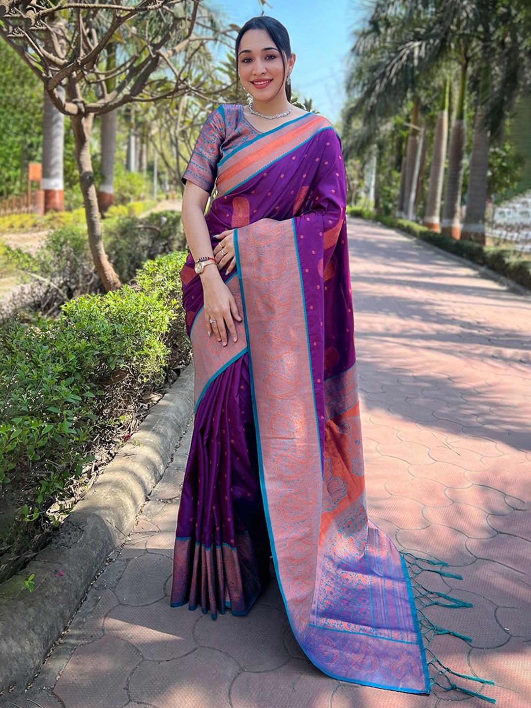 

Rangtulika Ethnics Woven Design Zari Banarasi Saree, Purple