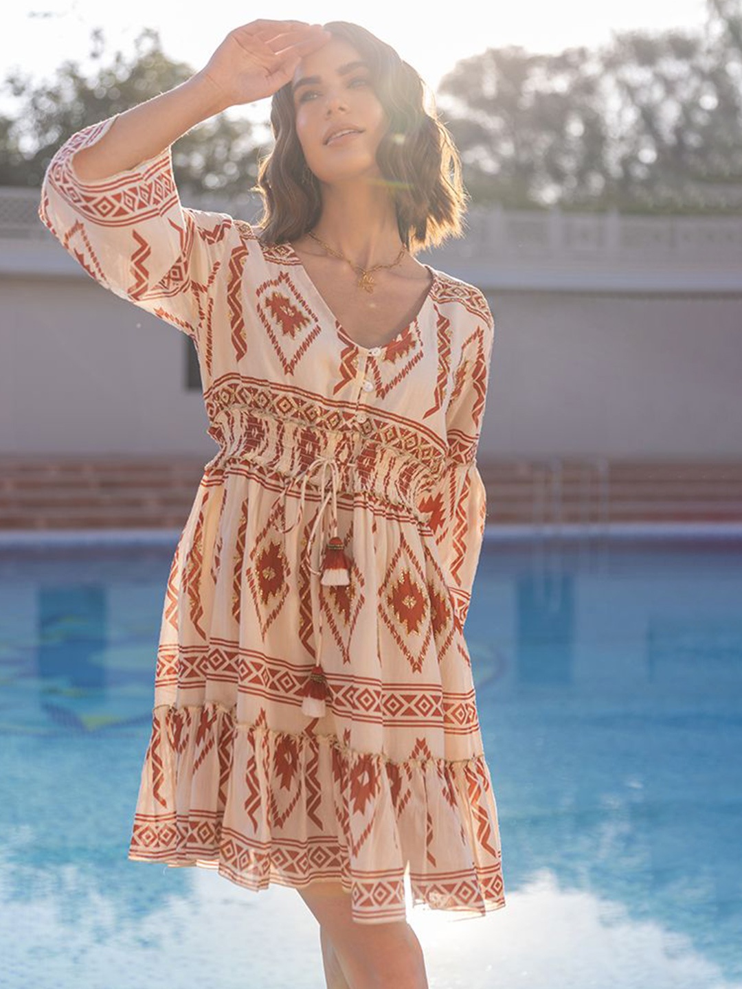 

Label Reyya Women Cotton Ethnic Motifs Printed A-Line Dress, Rust