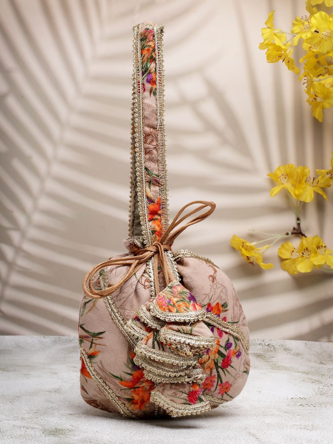 

Dhrohar Embroidered Potli Clutch, Brown