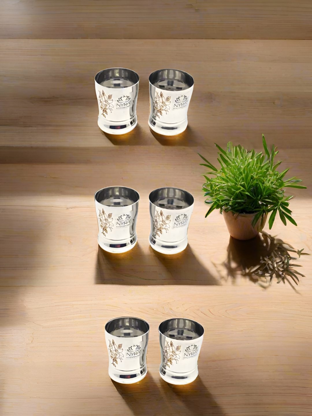 

Nyra Kitchenware Silver-Toned 6 Pieces Floral Stainless Steel Water Glasses-156 ml Each