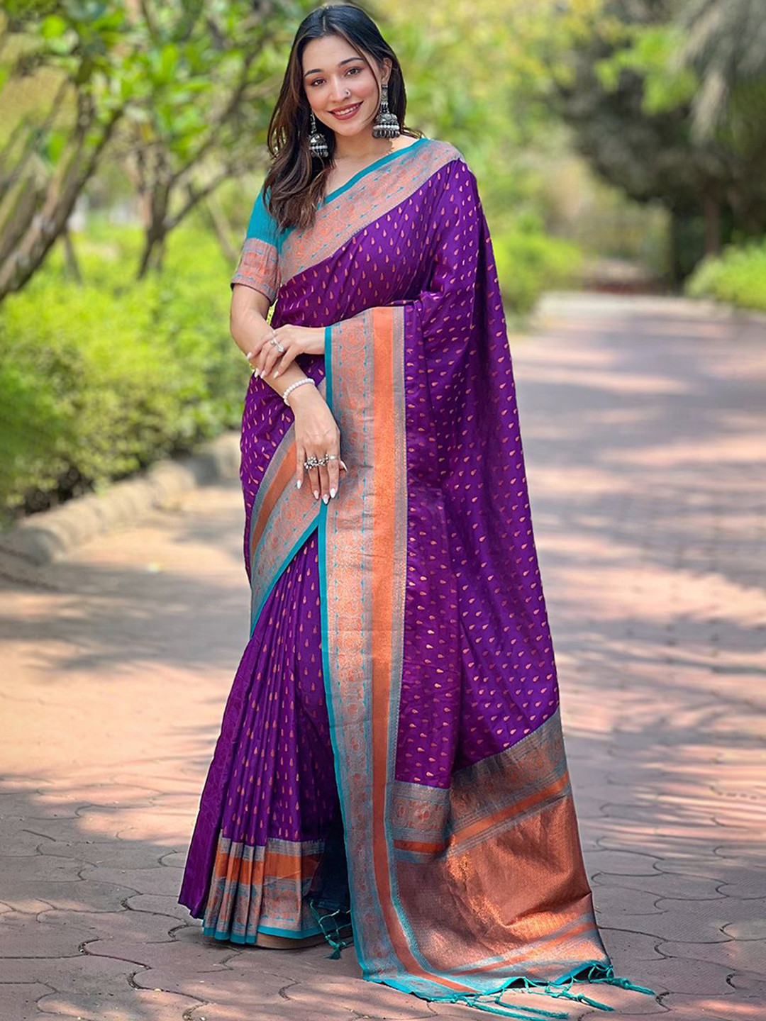 

Rangtulika Ethnics Woven Design Zari Banarasi Saree, Purple