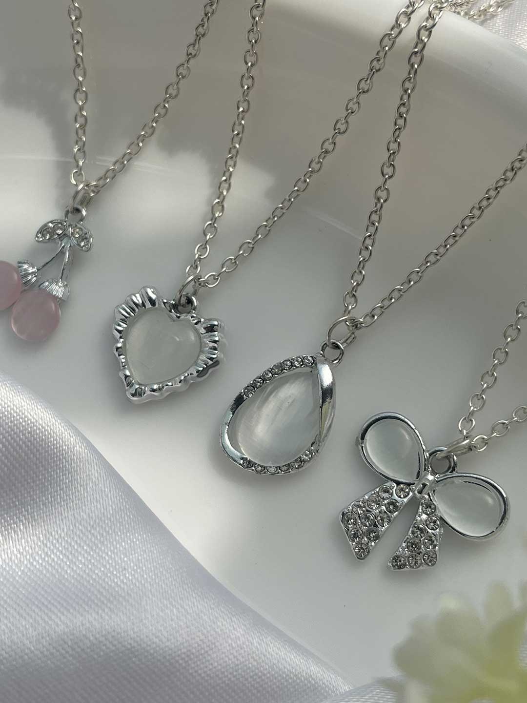 

Jewelsbysirani Pack Of 4 Silver-Plated Stone-Studded Pendants With Chains