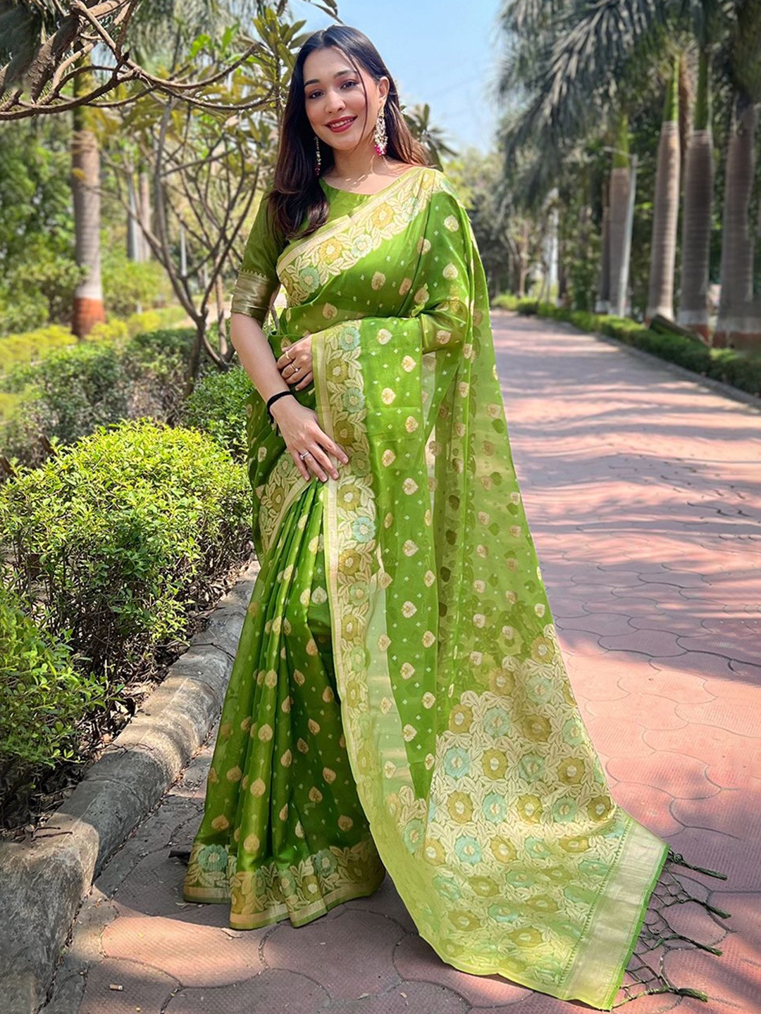 

Rangtulika Ethnics Floral Woven Design Zari Organza Banarasi Saree, Green