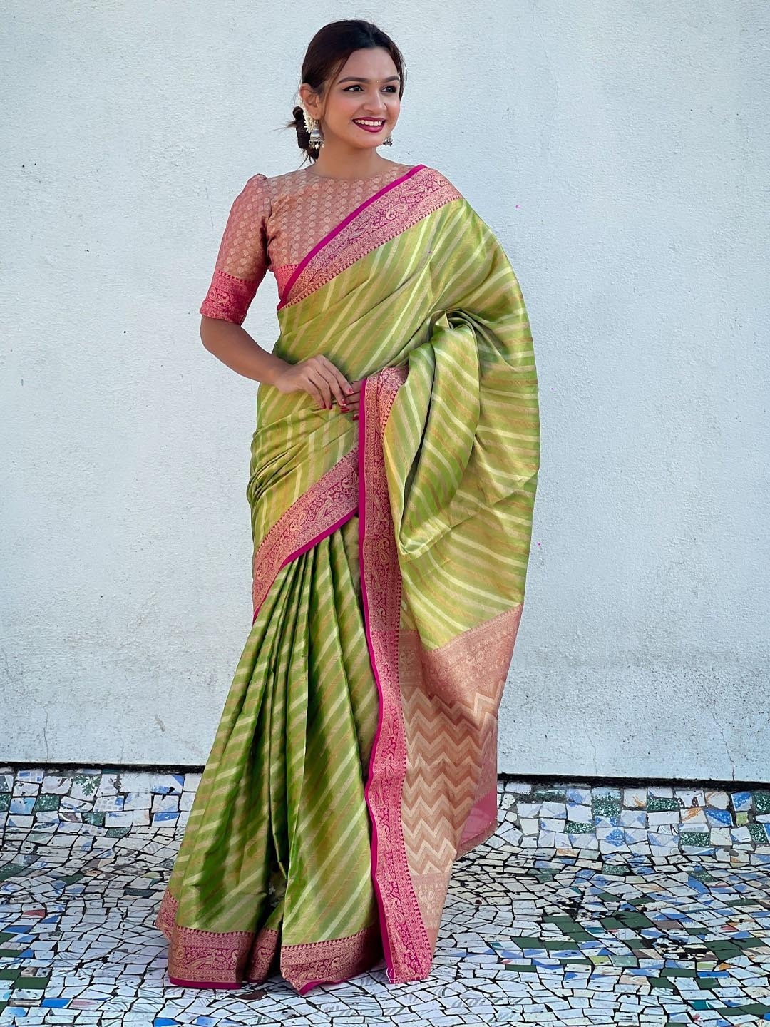 

Rangtulika Ethnics Leheriya Woven Design Zari Saree, Green