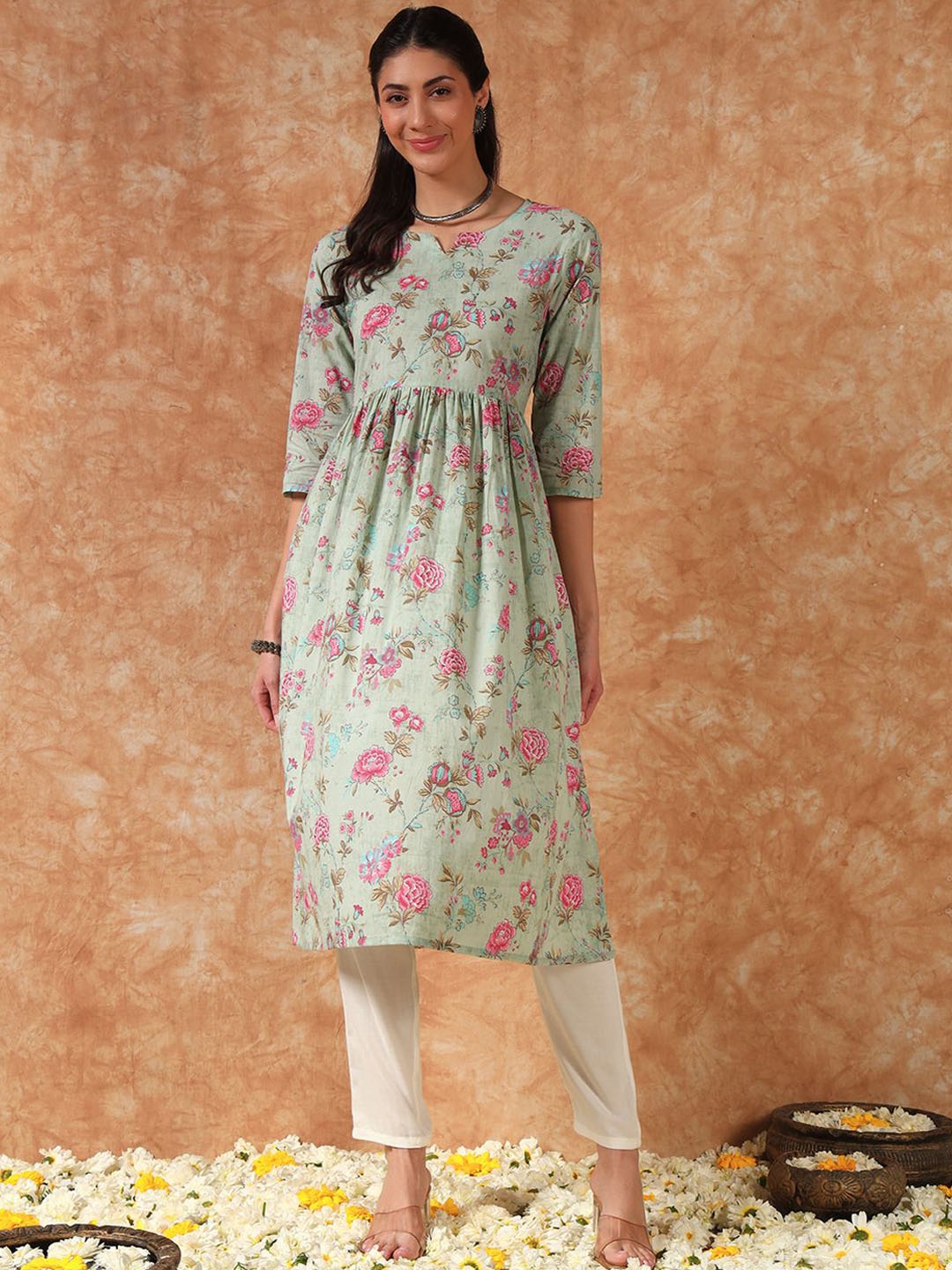 

Meeranshi Floral Printed Notch Neck Three-Quarter Sleeves Pleated Cotton A-Line Kurta, Green