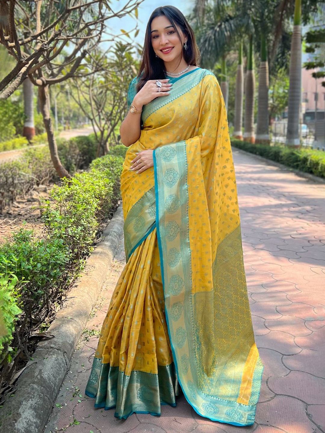 

Rangtulika Ethnics Woven Design Zari Kanjeevaram Saree, Yellow