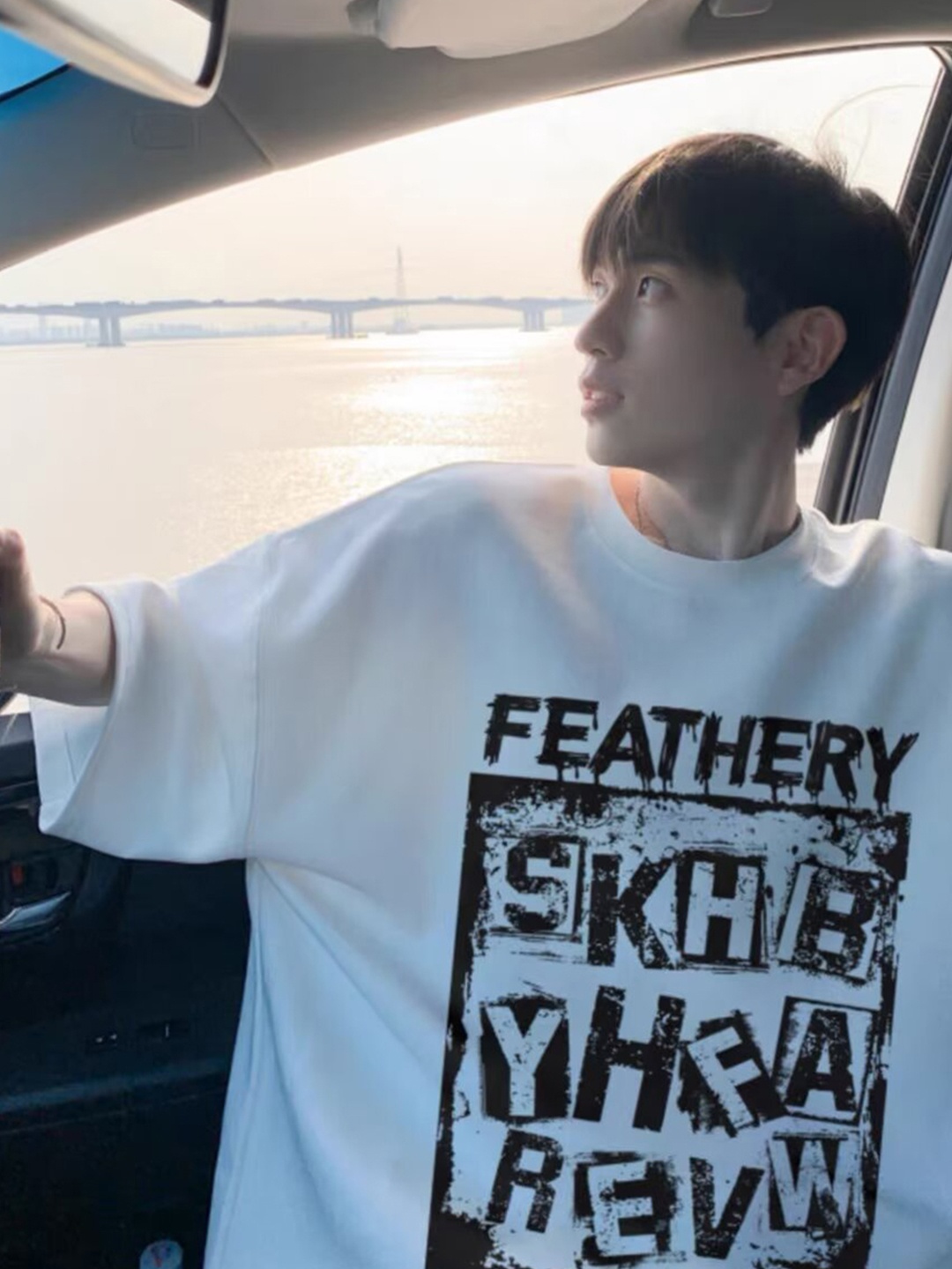 

StyleCast x Revolte Men Typography Printed Round Neck Cotton Oversized T-shirt, White