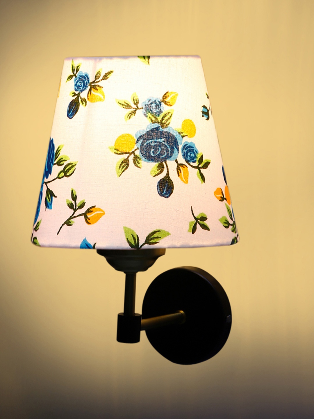 

Devansh White & Gold-Toned Printed Metal Traditional Frustum Shaped Wall Lamp
