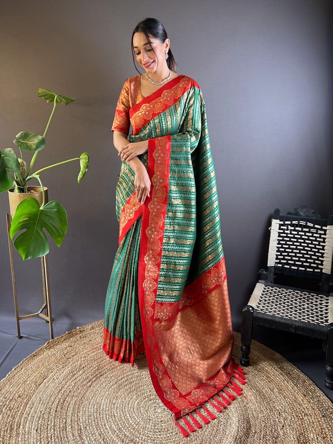 

Rangtulika Ethnics Woven Design Zari Paithani Saree, Green