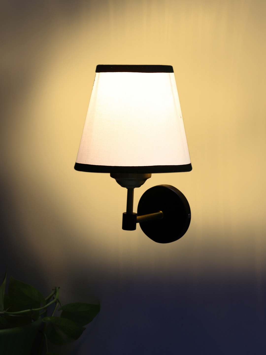 

Devansh White & Black Metal Contemporary Abstract Shaped Shaped Wall Lamp
