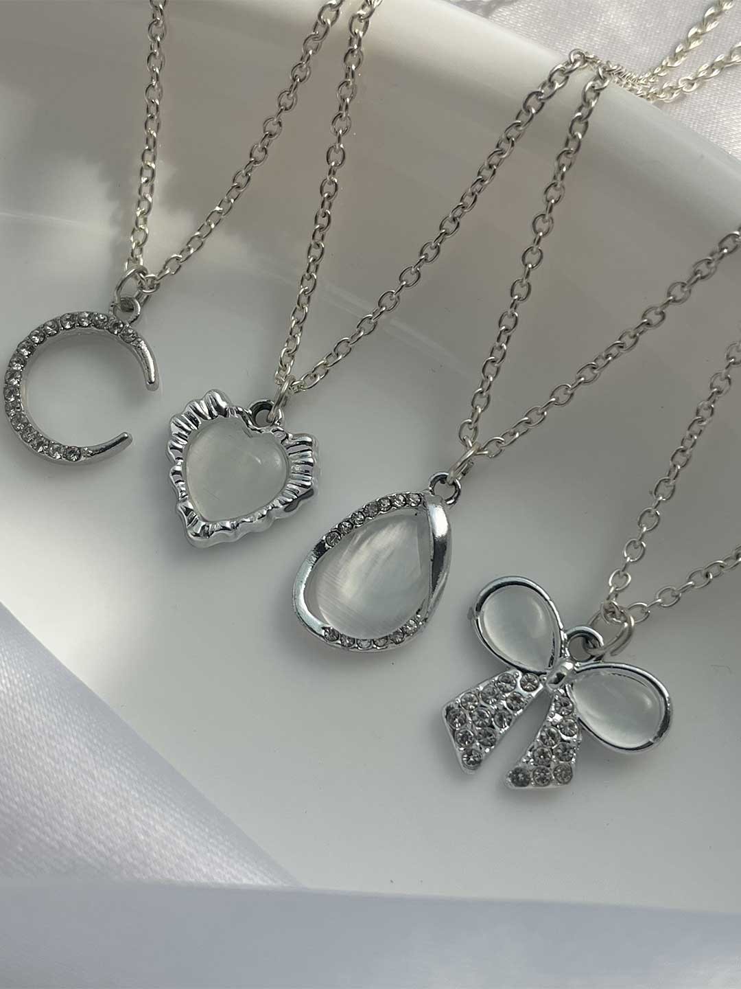 

Jewelsbysirani Set Of 4 Silver-Plated American Diamond Studded Pendants With Chains