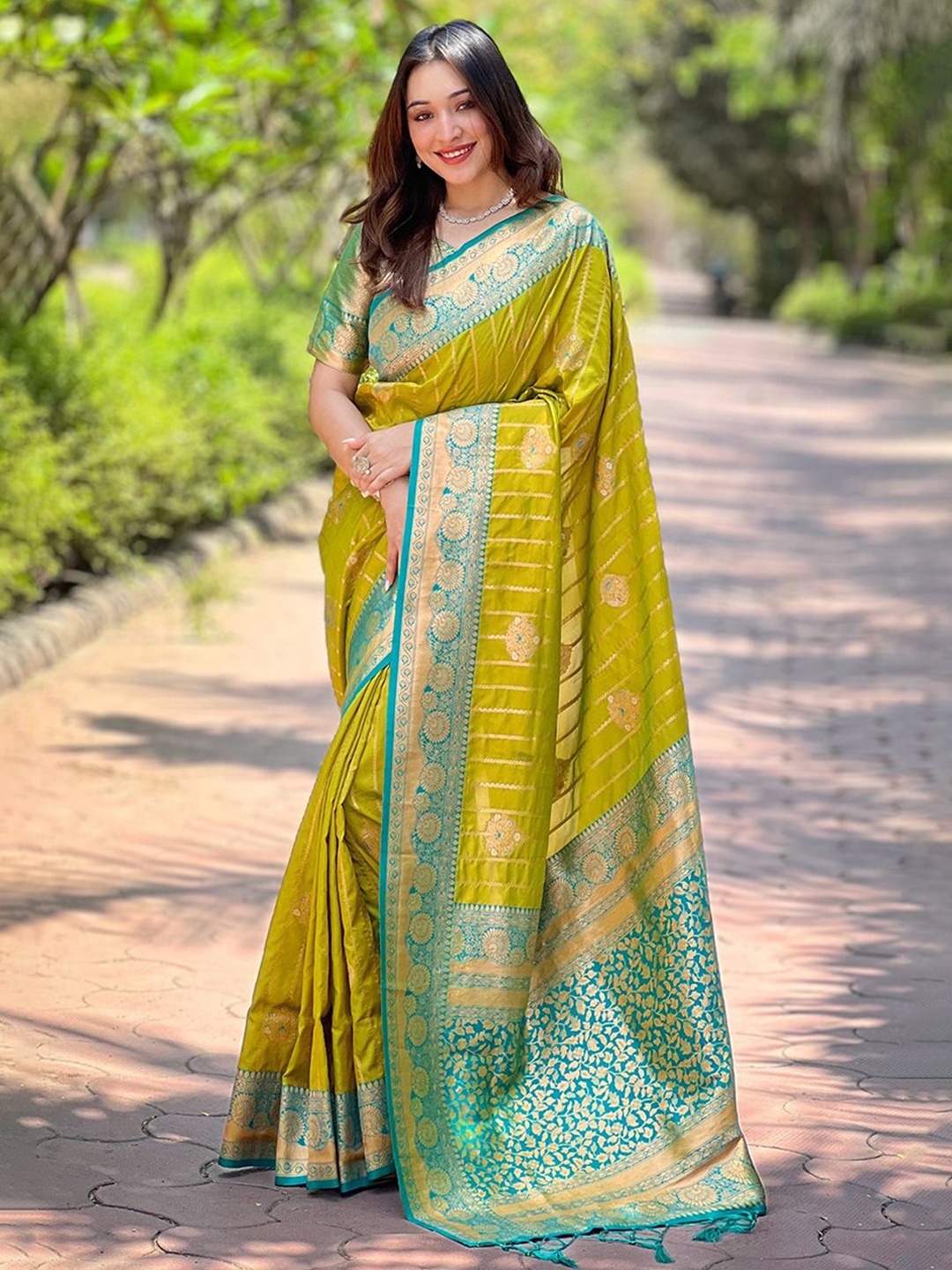 

Rangtulika Ethnics Woven Design Zari Saree, Green