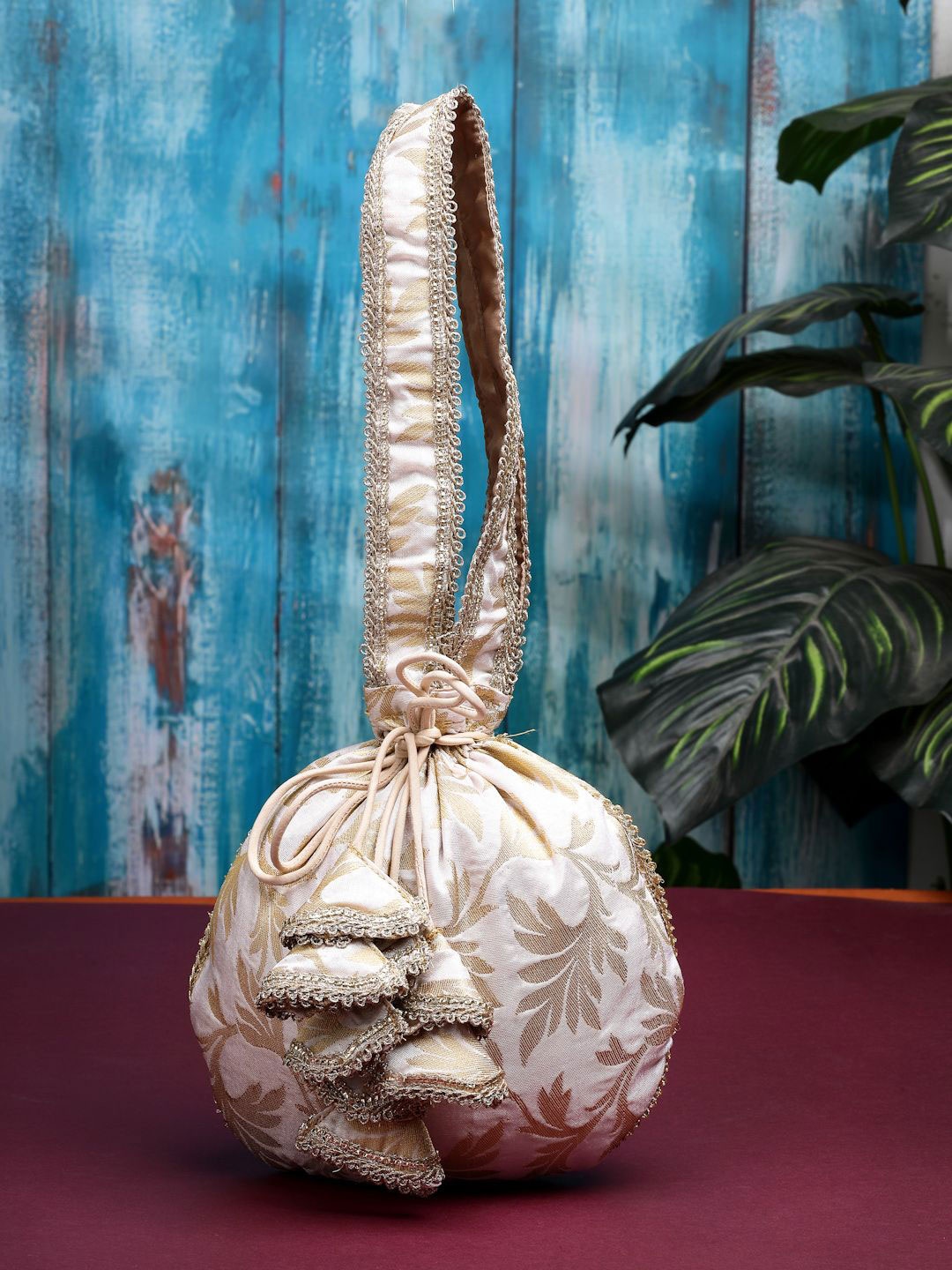 

Dhrohar Embroidered Potli Clutch, Beige