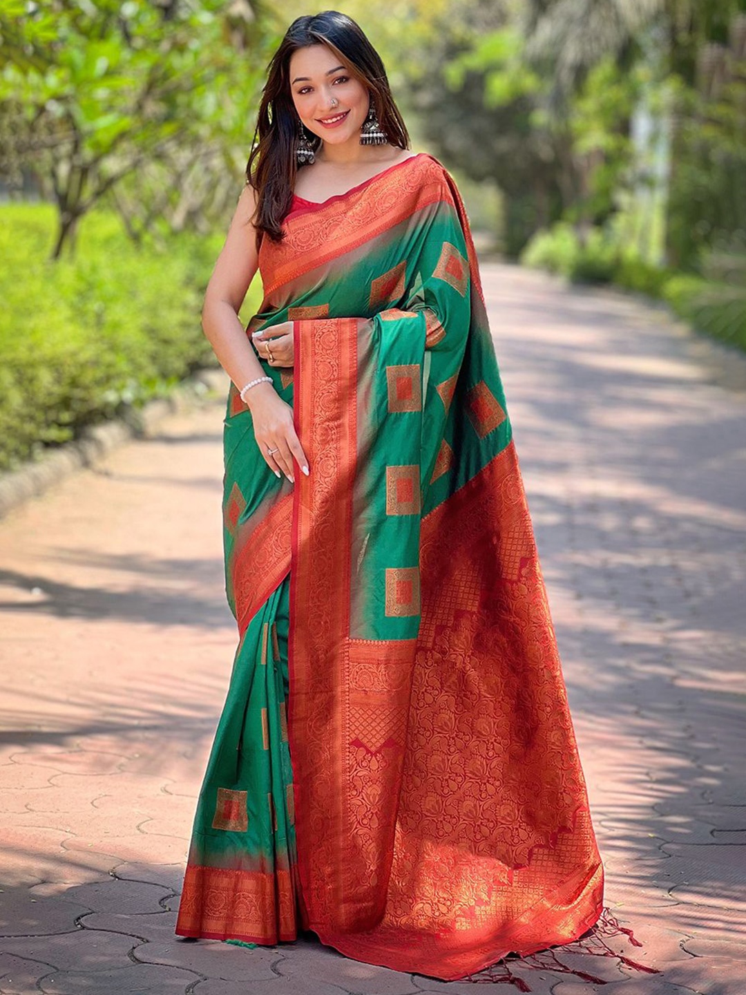 

Rangtulika Ethnics Woven Design Zari Saree With Contrast Blouse, Green