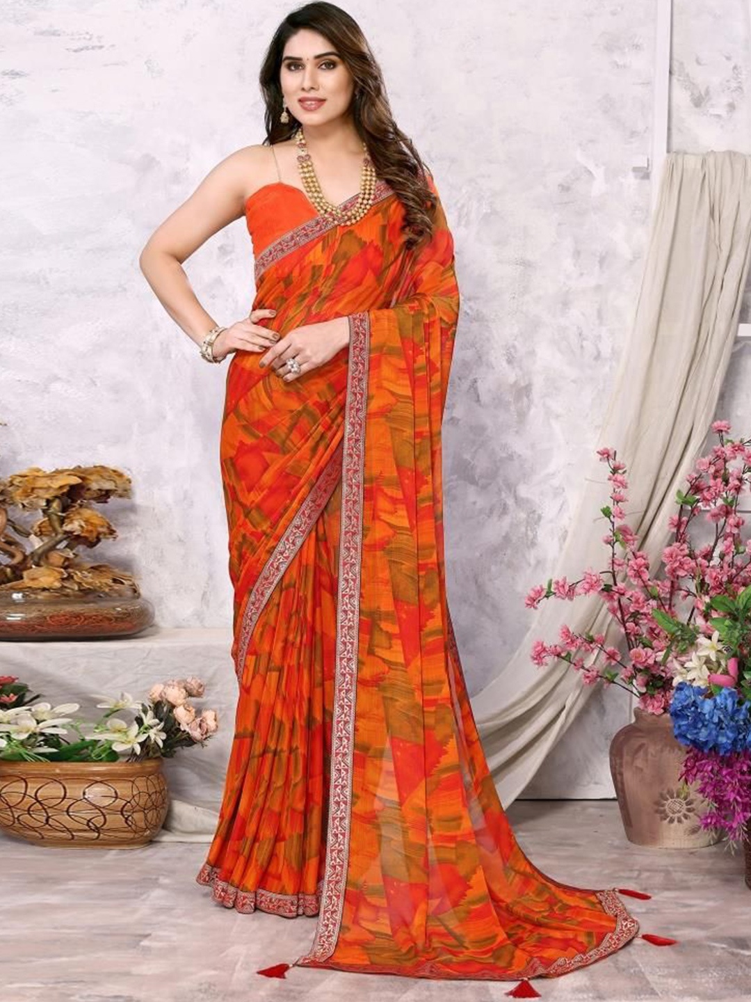 

Styleveda Printed Pure Georgette Woven Design Zari Saree, Orange