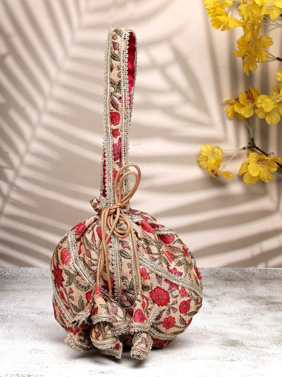 

Dhrohar Embroidered Wrist Loop Potli, Beige