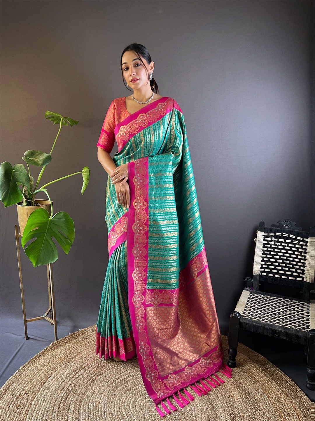 

Rangtulika Ethnics Woven Design Zari Saree, Green