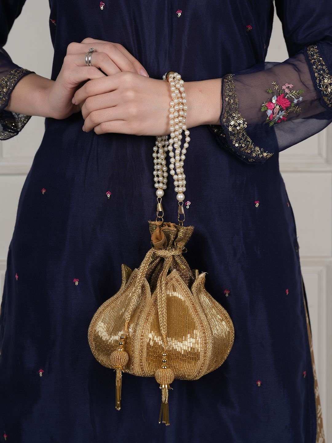 

Anouk Embellished Lotus Shaped Potli Clutch, Gold