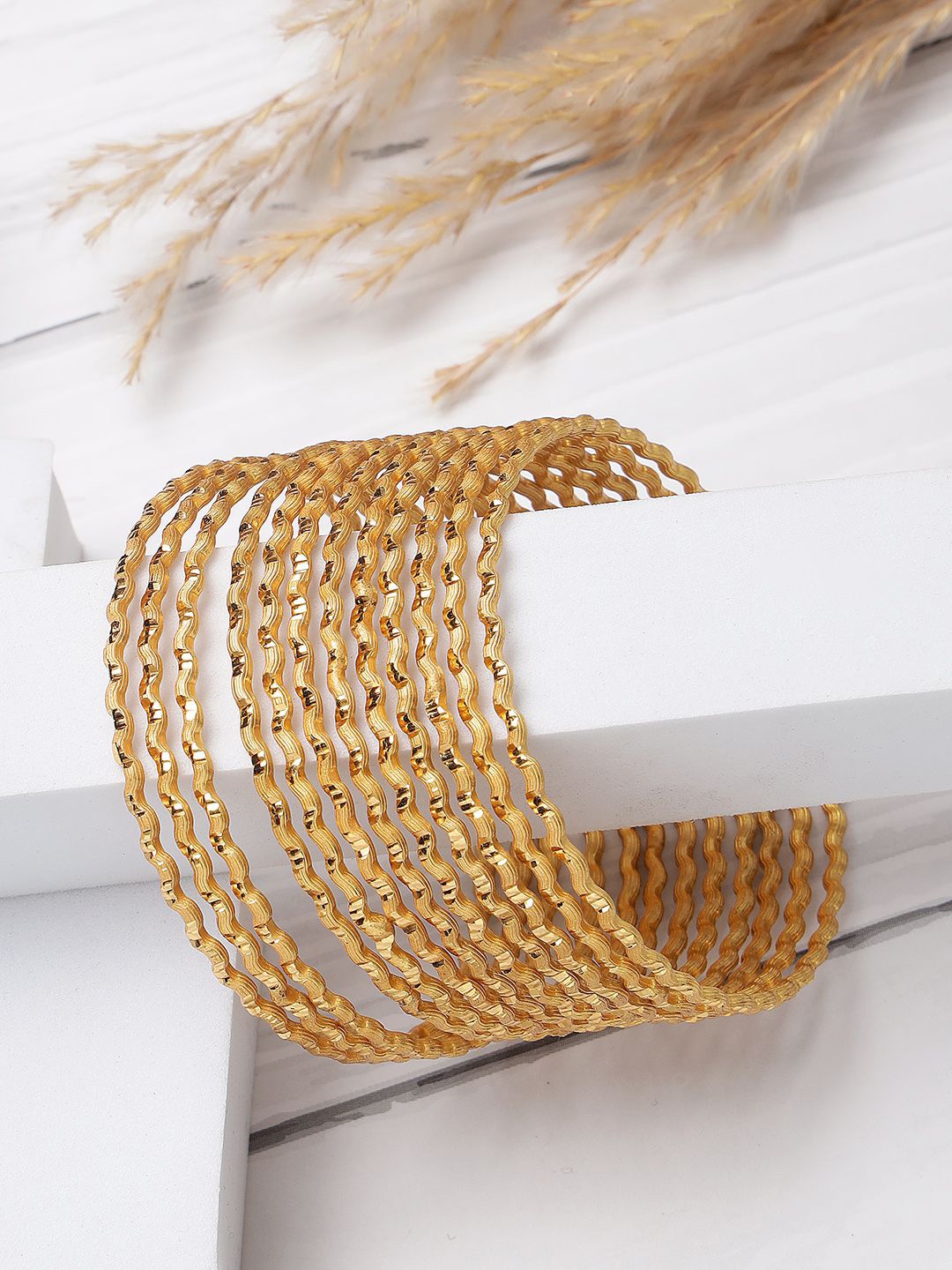 

ANIKAS CREATION Gold-Plated Bangles