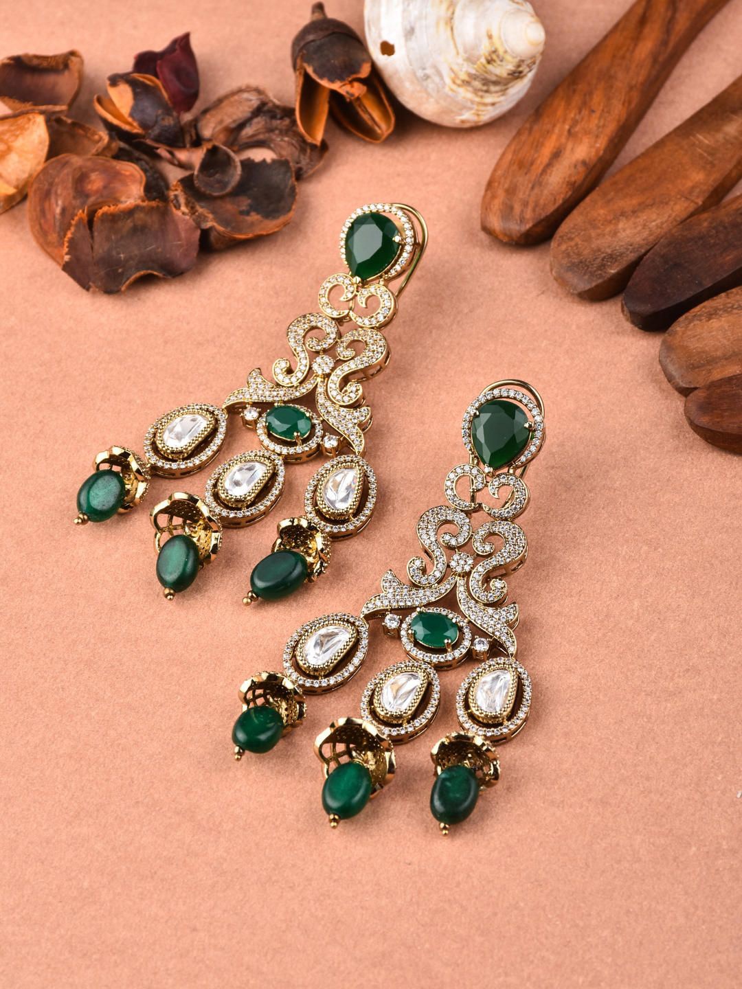 

Anouk Gold Plated Kundan Studded and Beaded Teardrop Shaped Drop Earrings
