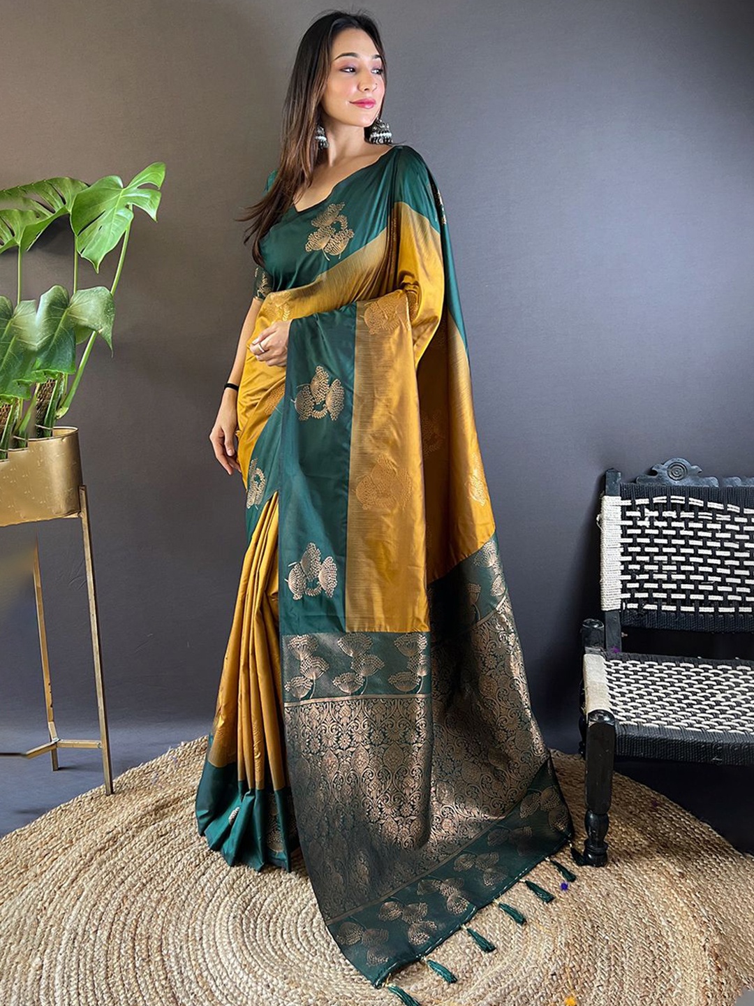 

Rangtulika Ethnics Motifs Woven Design Zari Paithani Saree, Yellow